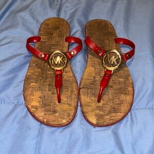 Red Michael Kors flip-flops